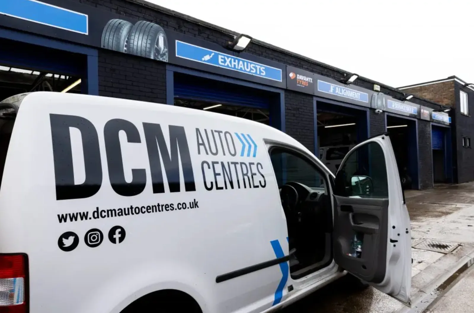 DCM Autocentres mobile tyre fitting van with its side door open